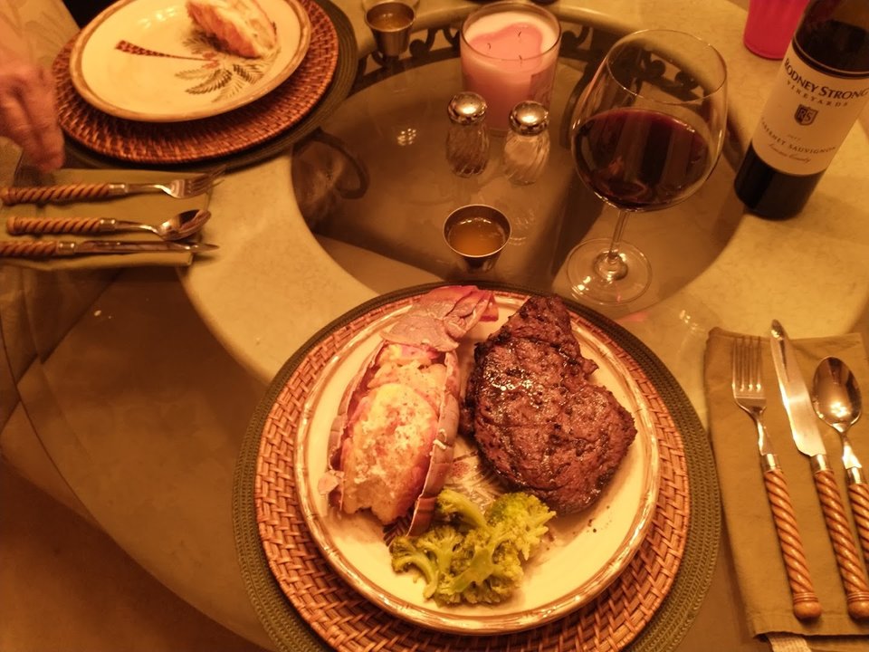 Restaurant plates arranged on a simple dining table.